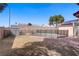 Fenced backyard pool with brick decking and desert landscaping at 6332 Sierra Pines Ct, Las Vegas, NV 89130