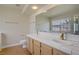 Bathroom featuring tile countertops, double sinks and a large mirror at 6332 Sierra Pines Ct, Las Vegas, NV 89130