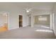 Bedroom boasting carpet floors, ceiling fan, closet and ensuite bathroom at 6332 Sierra Pines Ct, Las Vegas, NV 89130