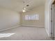 Spacious bedroom with vaulted ceiling, neutral colors and window providing natural light at 6332 Sierra Pines Ct, Las Vegas, NV 89130