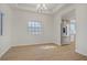 Dining area with modern stainless steel refrigerator and natural light at 6332 Sierra Pines Ct, Las Vegas, NV 89130