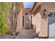 Inviting entryway with decorative security door and well-maintained stucco facade at 6332 Sierra Pines Ct, Las Vegas, NV 89130