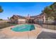 Inviting fenced pool with spacious patio, with desert landscaping surrounding the perimeter at 6332 Sierra Pines Ct, Las Vegas, NV 89130
