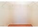 This walk-in closet has white walls, carpet, and wire shelving at 6955 N Durango Dr # 2099, Las Vegas, NV 89149