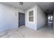 Hallway entrance featuring unit number 2099 with a welcome mat and clean hallway at 6955 N Durango Dr # 2099, Las Vegas, NV 89149