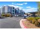 Secured community entrance featuring a gated entry and well-maintained landscaping at 6955 N Durango Dr # 2099, Las Vegas, NV 89149