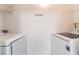This laundry room features a washer and dryer at 6955 N Durango Dr # 2099, Las Vegas, NV 89149
