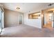 Spacious living area with open kitchen view, and balcony access at 6955 N Durango Dr # 2099, Las Vegas, NV 89149