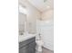 Elegant bathroom with modern vanity, stylish mirror, and shower-tub combo at 790 Lone Pine Rd, Pahrump, NV 89048