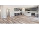 Spacious kitchen with grey cabinets, a kitchen island, and stainless steel appliances at 790 Lone Pine Rd, Pahrump, NV 89048