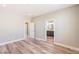 Main bedroom showcasing hardwood floors and an en-suite bathroom at 790 Lone Pine Rd, Pahrump, NV 89048
