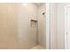 Modern shower featuring stylish tile work, a shower niche, and sleek fixtures at 790 Lone Pine Rd, Pahrump, NV 89048