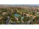 Community aerial view with tennis courts, pool and lush landscaping at 8244 Horseshoe Bend Ln, Las Vegas, NV 89113