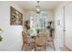 Dining area with a round table, wicker chairs, and plenty of natural light at 8244 Horseshoe Bend Ln, Las Vegas, NV 89113