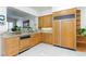 Kitchen featuring granite countertops, custom cabinets, and tile flooring at 8244 Horseshoe Bend Ln, Las Vegas, NV 89113