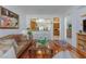 Open concept living room showcasing the kitchen and breakfast bar at 8244 Horseshoe Bend Ln, Las Vegas, NV 89113