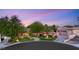 Beautiful single-story home featuring meticulous landscaping, mature trees, and circular driveway at 8275 W Craig Rd, Las Vegas, NV 89129