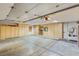 Spacious garage with ample storage cabinets and a clean, well-maintained floor at 8275 W Craig Rd, Las Vegas, NV 89129
