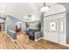 Spacious living room features hard surface floors, and multiple seating areas at 8275 W Craig Rd, Las Vegas, NV 89129