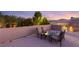 This rooftop patio features comfortable seating and lovely views at 8275 W Craig Rd, Las Vegas, NV 89129