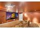 Private home theater with a large screen, recliner seating, and professional sound system at 8275 W Craig Rd, Las Vegas, NV 89129