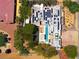 Aerial view of a modern home showing a pool, patios, solar panels, and lush landscaping at 8525 W Verde Way, Las Vegas, NV 89149