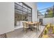 A charming outdoor dining area sits just outside the open-concept kitchen at 8525 W Verde Way, Las Vegas, NV 89149