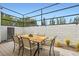 Stylish outdoor dining area featuring a modern table with seating for six at 8525 W Verde Way, Las Vegas, NV 89149