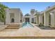 A beautifully designed water feature enhances the front yard at 8525 W Verde Way, Las Vegas, NV 89149