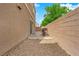 The backyard features a patio area and a section covered with decorative rocks at 9024 Hazy Haven Ct, Las Vegas, NV 89149