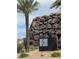 Attractive entrance sign surrounded by rocks and palm trees, enhancing community appeal at 917 Vegas View Dr, Henderson, NV 89052