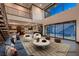 Open-concept space with modern decor, a view to outdoor living, and a gourmet kitchen nearby at 917 Vegas View Dr, Henderson, NV 89052