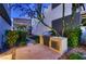 Modern outdoor kitchen equipped with a grill and sink, surrounded by lush greenery at 917 Vegas View Dr, Henderson, NV 89052