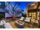 This modern patio features comfortable seating and a glimpse of the interior at 917 Vegas View Dr, Henderson, NV 89052