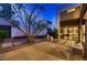 Modern patio with stepping stones, rocks, seating and a peak into the kitchen at 917 Vegas View Dr, Henderson, NV 89052