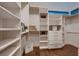 Spacious walk-in closet with custom shelving and drawers for optimal organization at 917 Vegas View Dr, Henderson, NV 89052