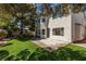 Well-maintained backyard features a lush lawn and patio space for outdoor entertaining at 9491 Gainey Ranch Ave, Las Vegas, NV 89147
