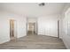 This bedroom has two large mirrored closets and wood-look floors at 9491 Gainey Ranch Ave, Las Vegas, NV 89147