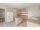Bright kitchen featuring ample cabinets, granite countertops, and stainless steel appliances at 9491 Gainey Ranch Ave, Las Vegas, NV 89147