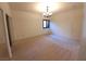 The bedroom features neutral carpeting, a window, a closet, and a modern ceiling fan at 9580 W Reno Ave # 183, Las Vegas, NV 89148