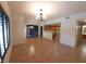 Living area with tile floors, natural light, and an open floor plan leading to the kitchen at 9580 W Reno Ave # 183, Las Vegas, NV 89148