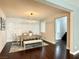 Dining room featuring a modern light fixture, dining table with chairs and a bench and unique accent wall at , Las Vegas, NV 89135