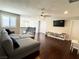 This spacious living room features hardwood floors, a sectional couch, and plenty of natural light at , Las Vegas, NV 89135
