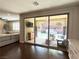 Open living area flows to outdoor patio with modern furniture and hardscaped yard via sliding glass doors at , Las Vegas, NV 89135
