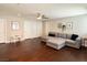 Bright and airy living room with hardwood floors, a comfortable sectional, and ample space for entertaining at , Las Vegas, NV 89135
