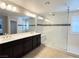 This main bathroom offers a large walk-in shower with dual shower heads and a dual sink vanity with plenty of space at , Las Vegas, NV 89135