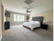 This spacious main bedroom features neutral paint, ceiling fan, and a large window for plenty of natural light at , Las Vegas, NV 89135