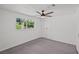 Bright bedroom with a ceiling fan and a view of outside at 1004 Yucca Ave, Las Vegas, NV 89104