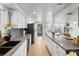 Modern kitchen with updated stainless steel appliances, spacious counters, and ample cabinets at 1004 Yucca Ave, Las Vegas, NV 89104