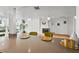 Open-concept living area with hard wood floors and views of outside at 1004 Yucca Ave, Las Vegas, NV 89104